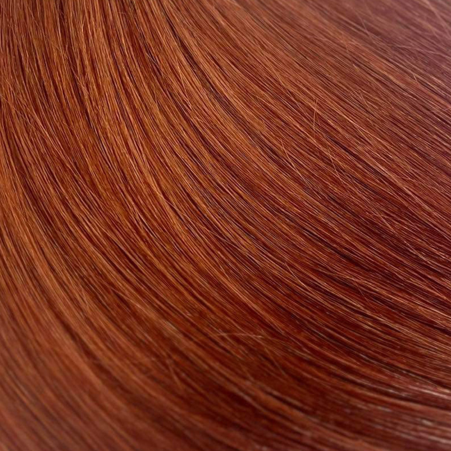 Close up photo of Natalie Michelle Hair Extensions in colour Ginger Spice.