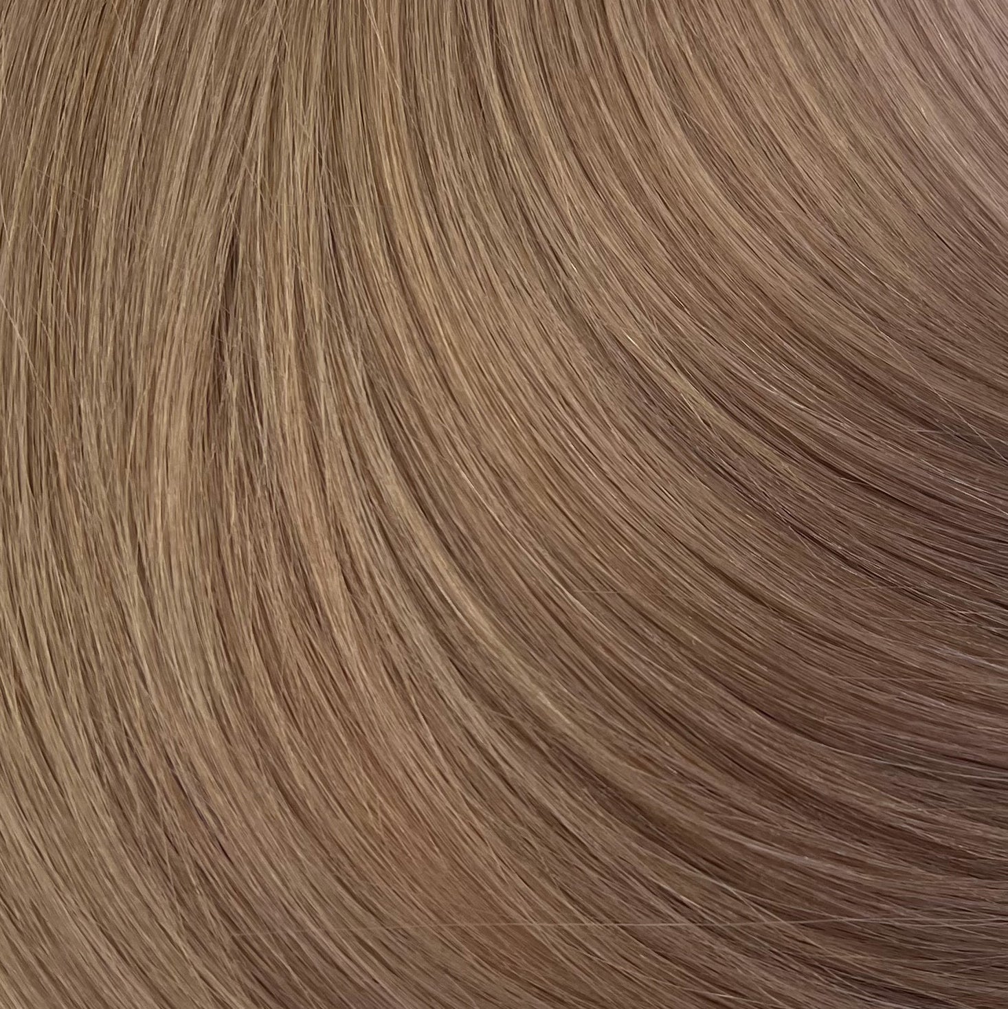 Close up photo of Natalie Michelle Hair Extensions in colour Bindi Sand.