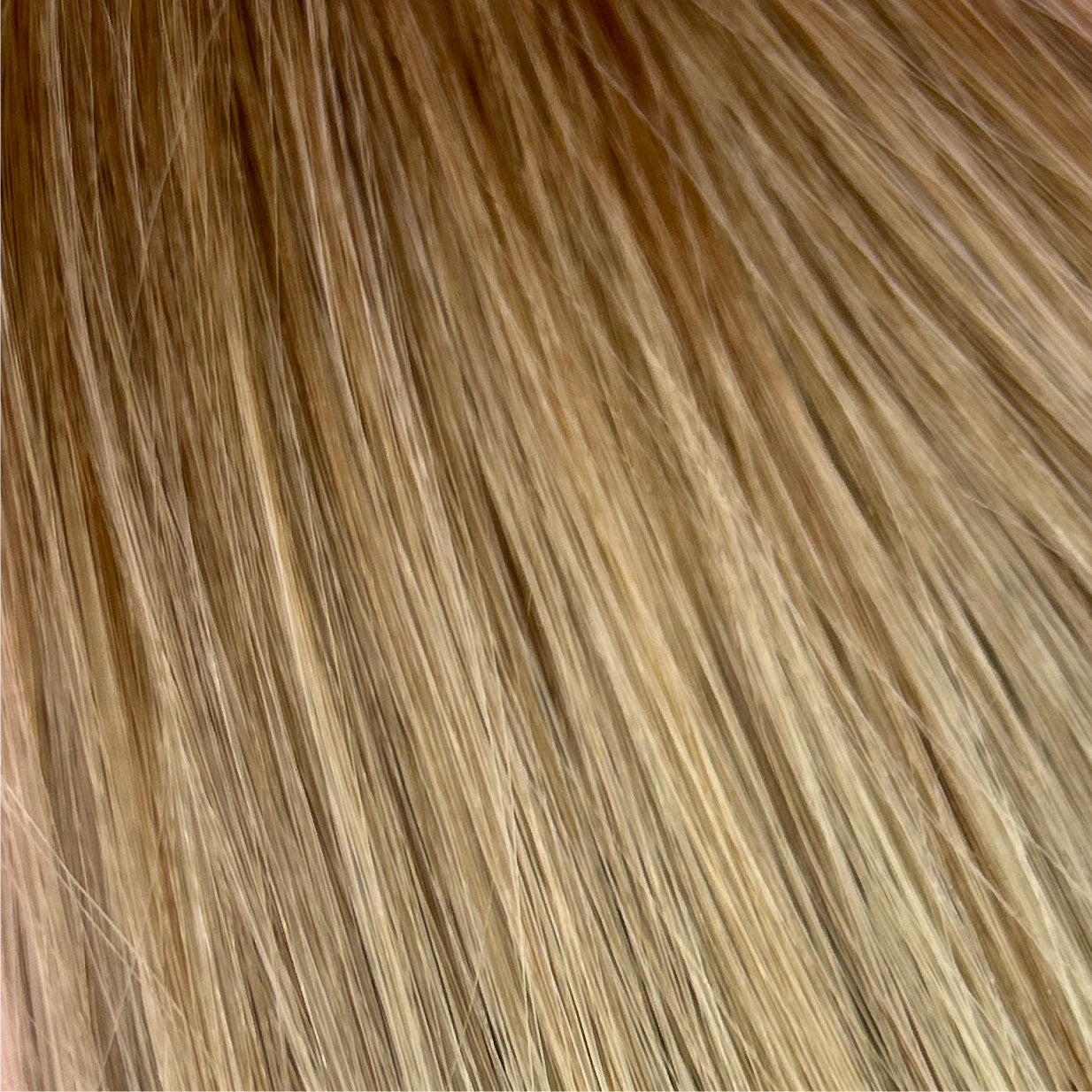 Close up photo of Natalie Michelle Hair Extensions in colour Jasper Jinx Balayage B6/18/60.