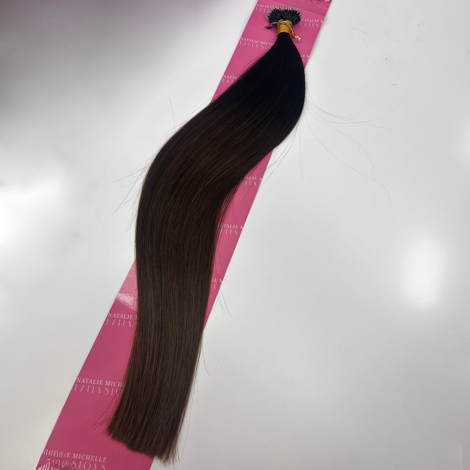 Close up photo of Natalie Michelle Hair Extensions in colour Belle Burnette Balayage T1/B4.