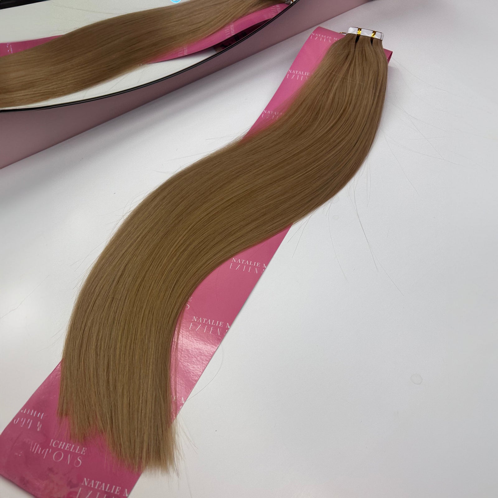 Close up photo of Natalie Michelle Hair Extensions in colour Bindi Sand.