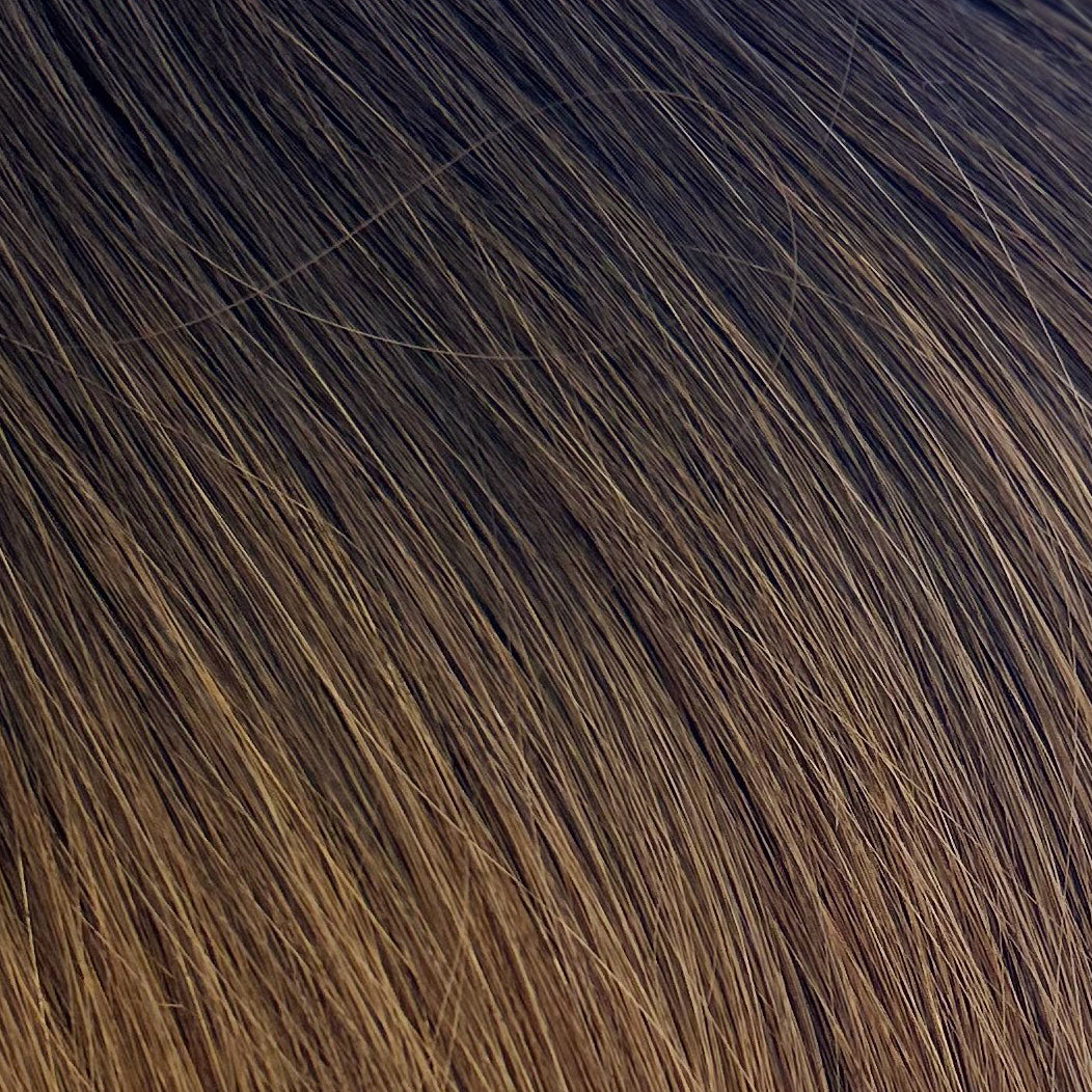 Close up photo of Natalie Michelle Hair Extensions in colour Belle Burnette Balayage T1/B4.