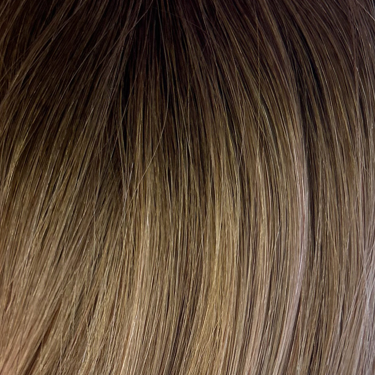Close up photo of Natalie Michelle Hair Extensions in colour Bronzella Balayage T2/14.