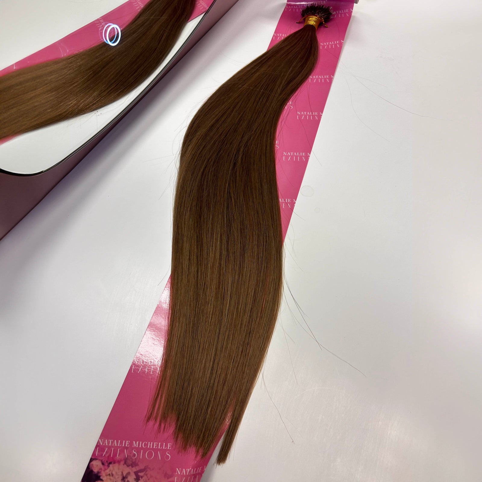 Close up photo of Natalie Michelle Hair Extensions in colour Teddy Russ.