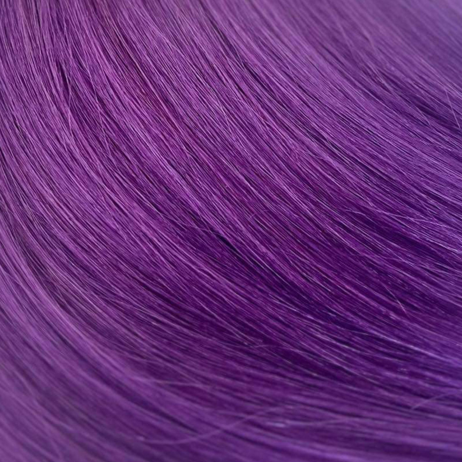 Close up photo of Natalie Michelle Hair Extensions in colour Violet Vixen.